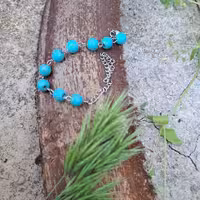 دستبند فیروزه ای استیل نقره ای(پس کرایه)