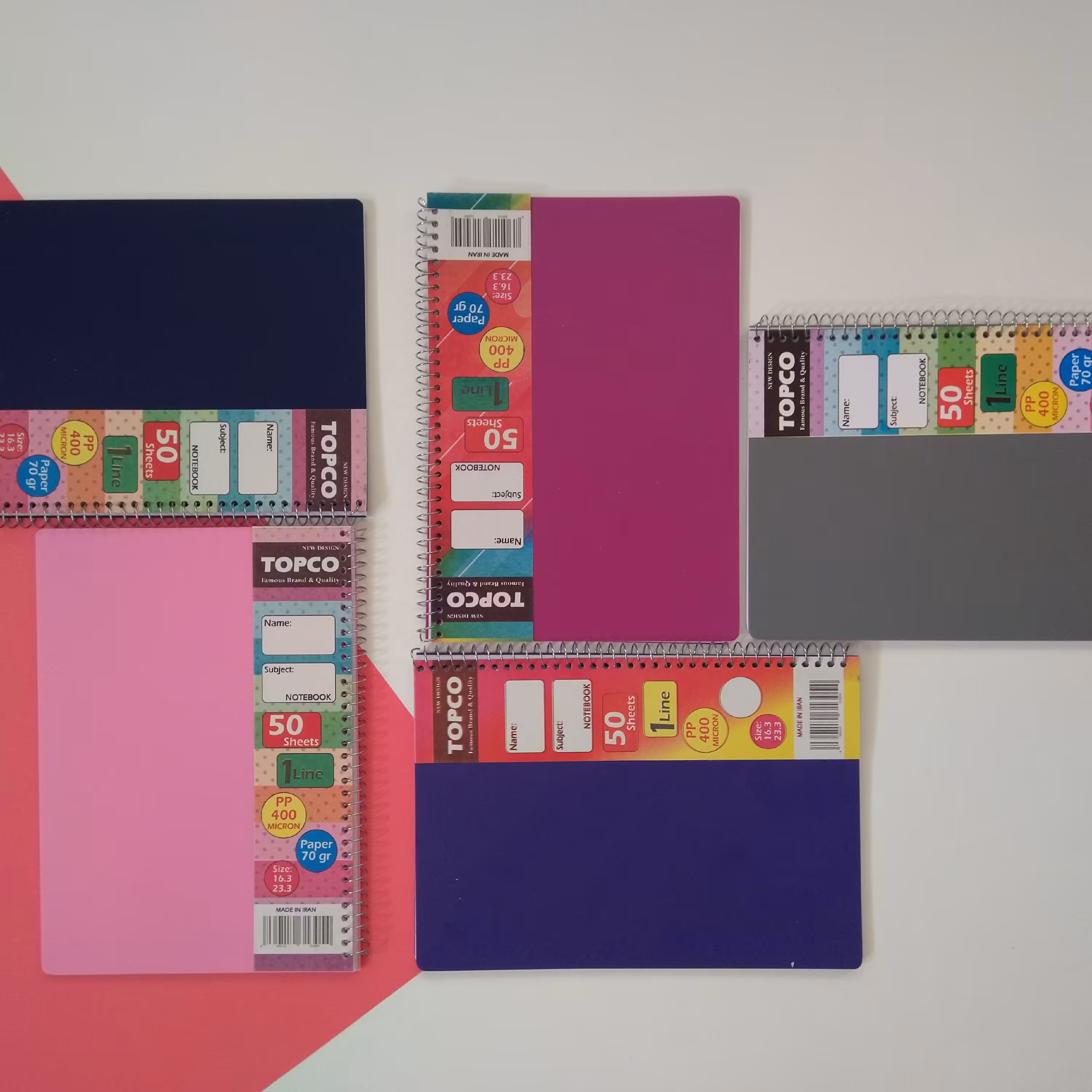دفتر 50 برگ .طرح ساده رنگی رنگی .معروف به پ پ .برند تاپکو