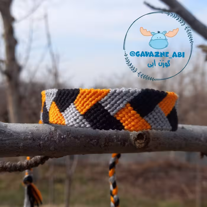 دستبند دوستی دستبافت طرح جکسون ( نارنجی و طوسی و مشکی) (بدون گیس اضافه) محصول کاملا دستساز تیم گوزن آبی