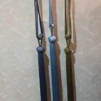 شرابه پرده جمع کن دکور در رنگ های سبز زیتونی و آبی روشن و آبی تیره جفت ترک (پس کرایه)
