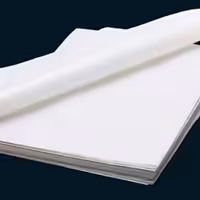 کاغذ مخصوص پخت شیرینی مومی سفید رنگ بریده شده . 36 در 26 سانت