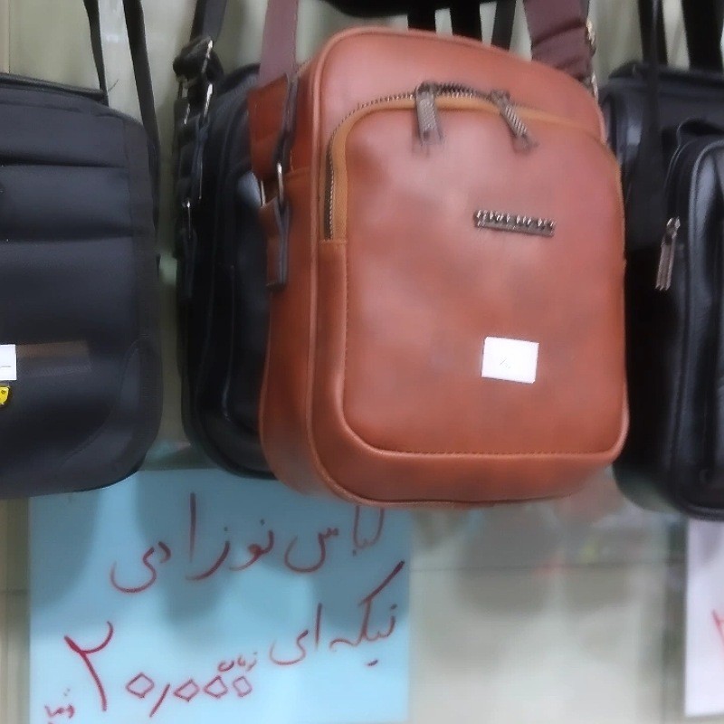 کیف پاسپورتی دوشی مردانه پسرانه اسپرت رنگ مشکی و عسلی پررنگ چرم صنعتی