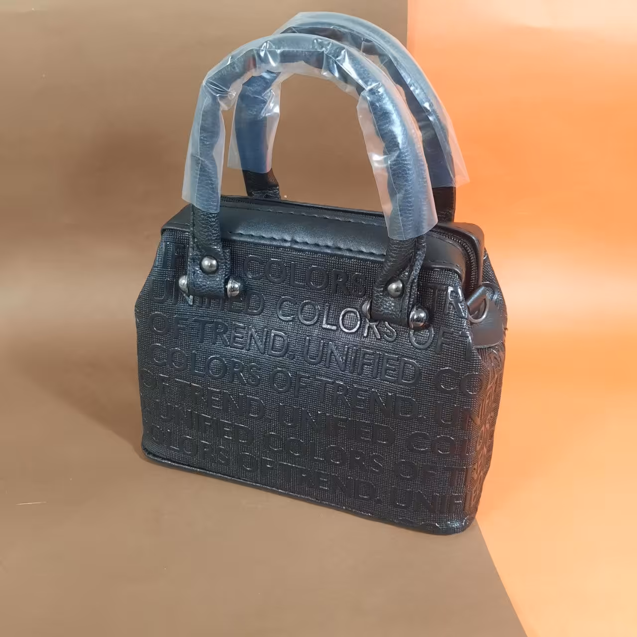 کیف زنانه صندوقی پلنگی