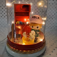 باکس موزیکال  وچراغدارشیشه ای طرح دختر یا اقا پسر کمد دار