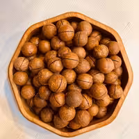 ماکادمیا یا بعبارتی فندق استرلیایی پرخاصیت و پرپروتئن(نیم کیلو)