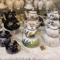 کتری وقوری لعابی درب الماسی دسته بغل هزینه ارسال به عهده مشتری محترم 