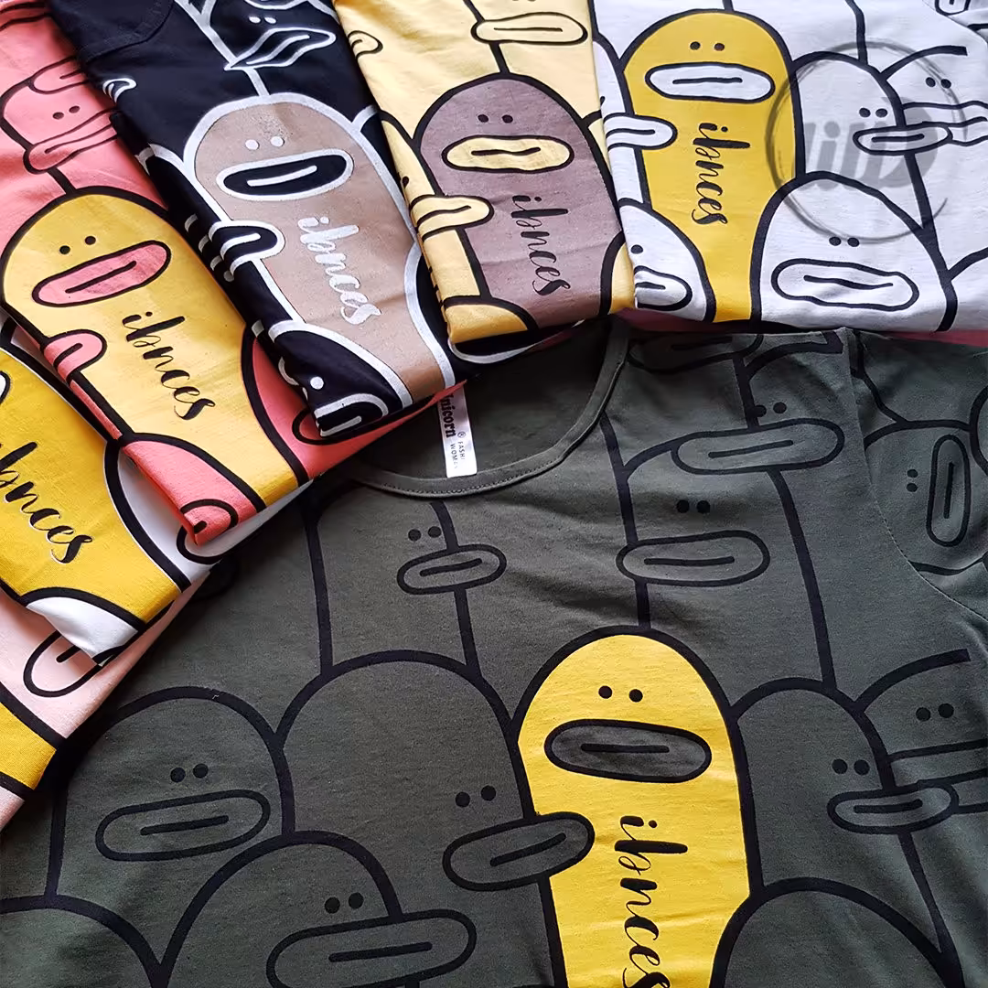 تیشرت طرح شلوغ اردک فانتزی دخترانه جنس نخ پنبه