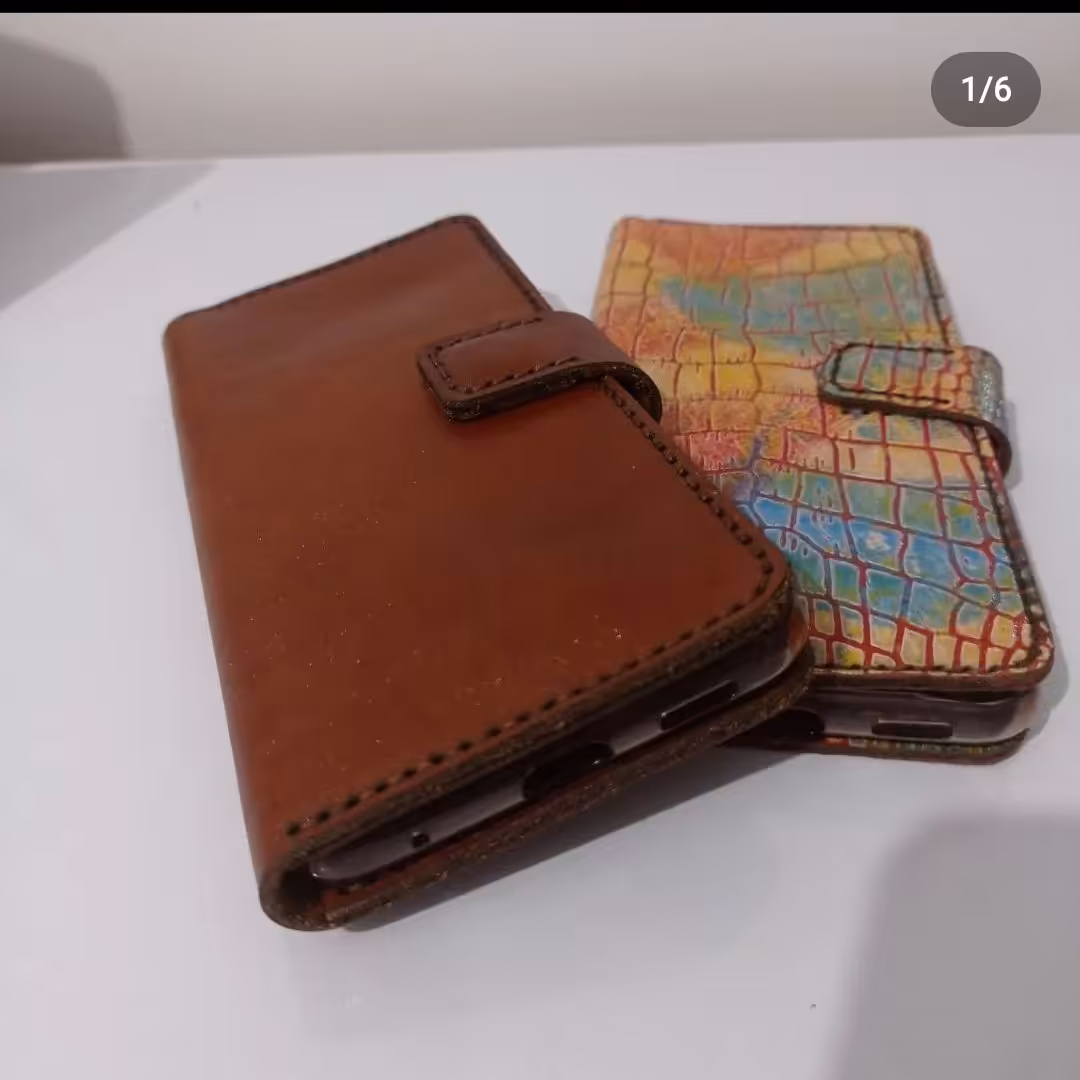 قاب موبایل کتابی .قابل اجرا برای انواع گوشی و با رنگ دلخواه