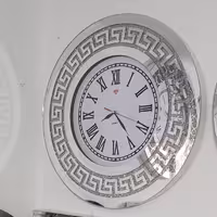 ساعت دیواری نگینی طرح ورساچ نگین نقره ایی(ارسال رایگان)