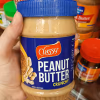 کره بادام زمینی  خارجی (هندی) کلاسی 510 گرمی با تکه های بادوم زمینی