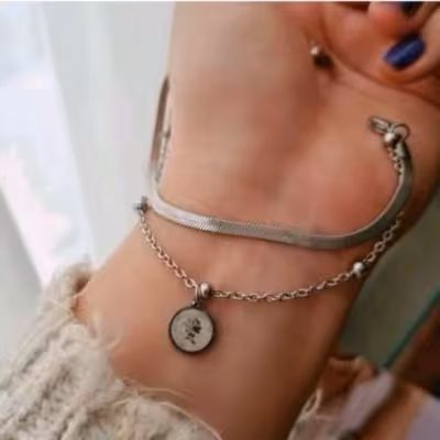 دستبند دو ردیفه ماری و توپی رنگ نقره ای