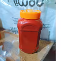 رب گوجه فرنگی خانگی 1100 گرمی روی هیزم پخته شده