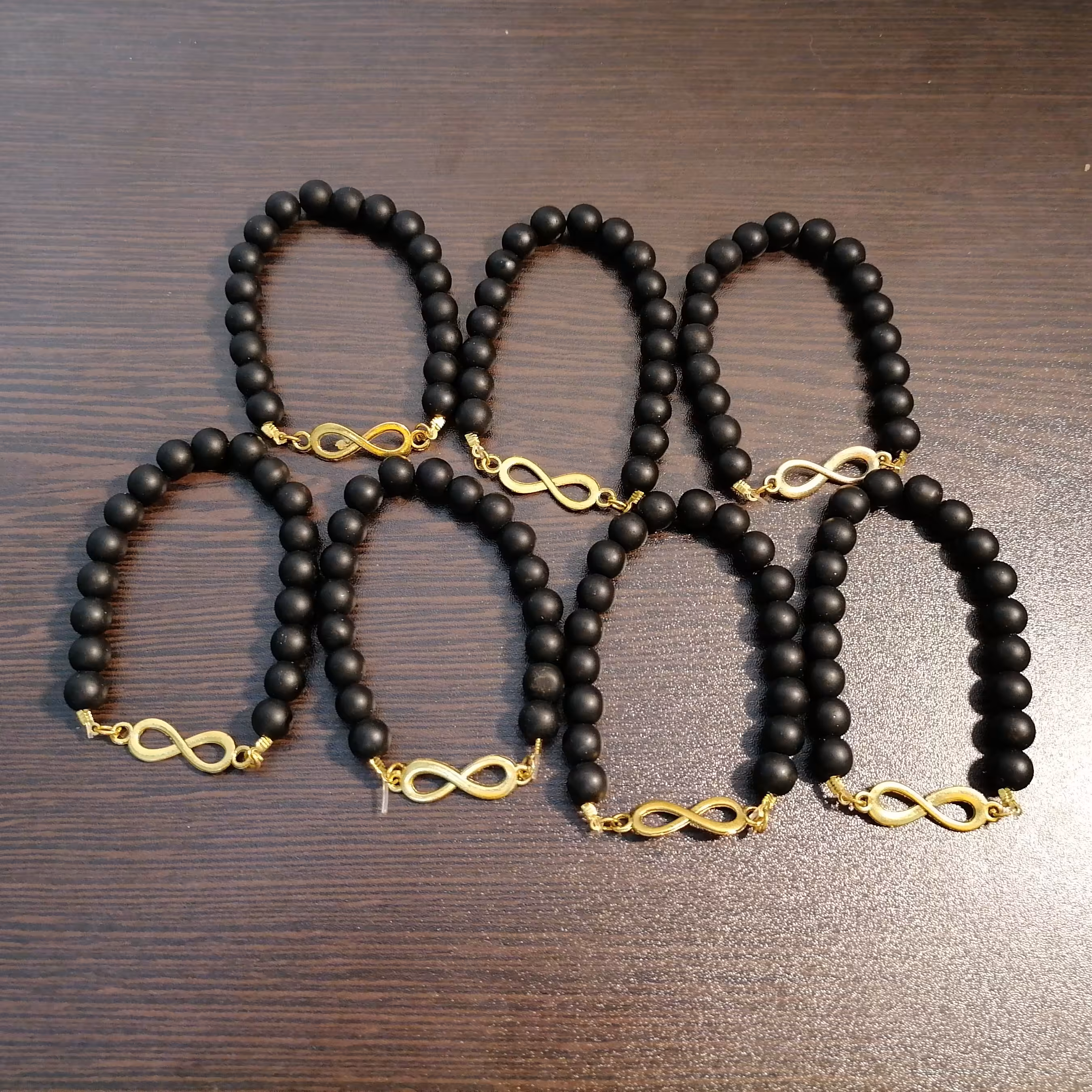 دستبند کشی اونیکس پلاک بی نهایت