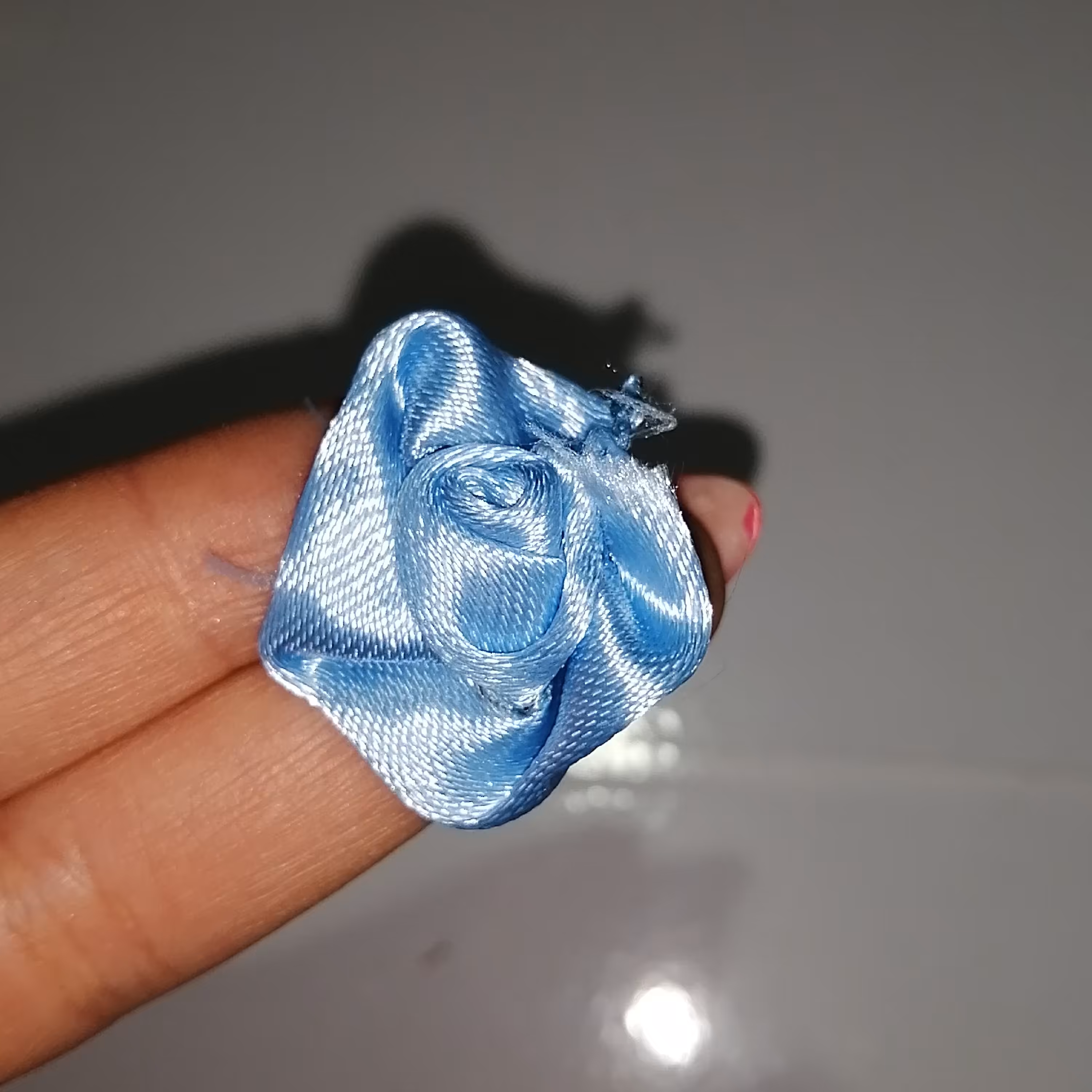 گل کوچک تزئینی ساتنی آبی 10 عددی 