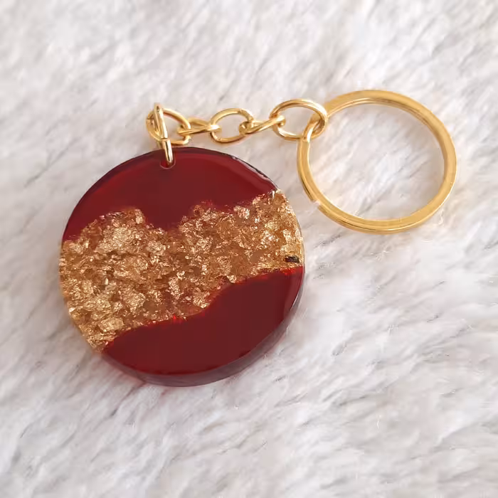 جاکلیدی گرد رزینی با تلفیق رنگ قرمز و ورق طلا