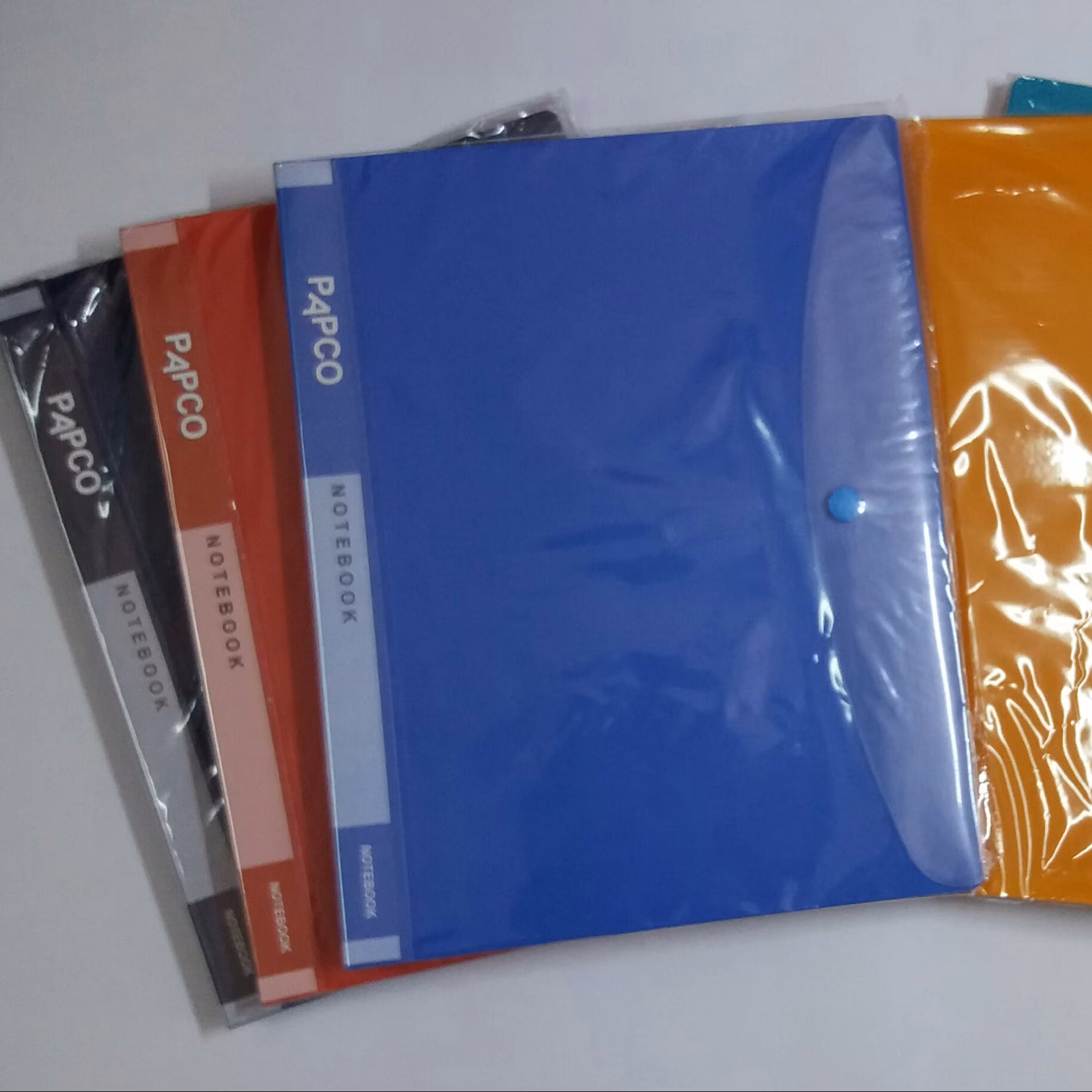 لوازم تحریر - دفتر کلاسوری جیبدار پاپکو   100برگ NB606 (در رنگ های متنوع)