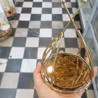 هفتسین و جا حلقه فلزی آینه دار  ( مدل گرد فلزی آبکاری شده طلایی) 