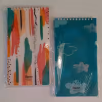 دفترچه یادداشت خبرنگاری الیپون80 برگ سایز12 در 22 جلد طلقی و فنر دوبل در 4 طرح زیبا صفحات شماره گذاری شده و 70 گرم 