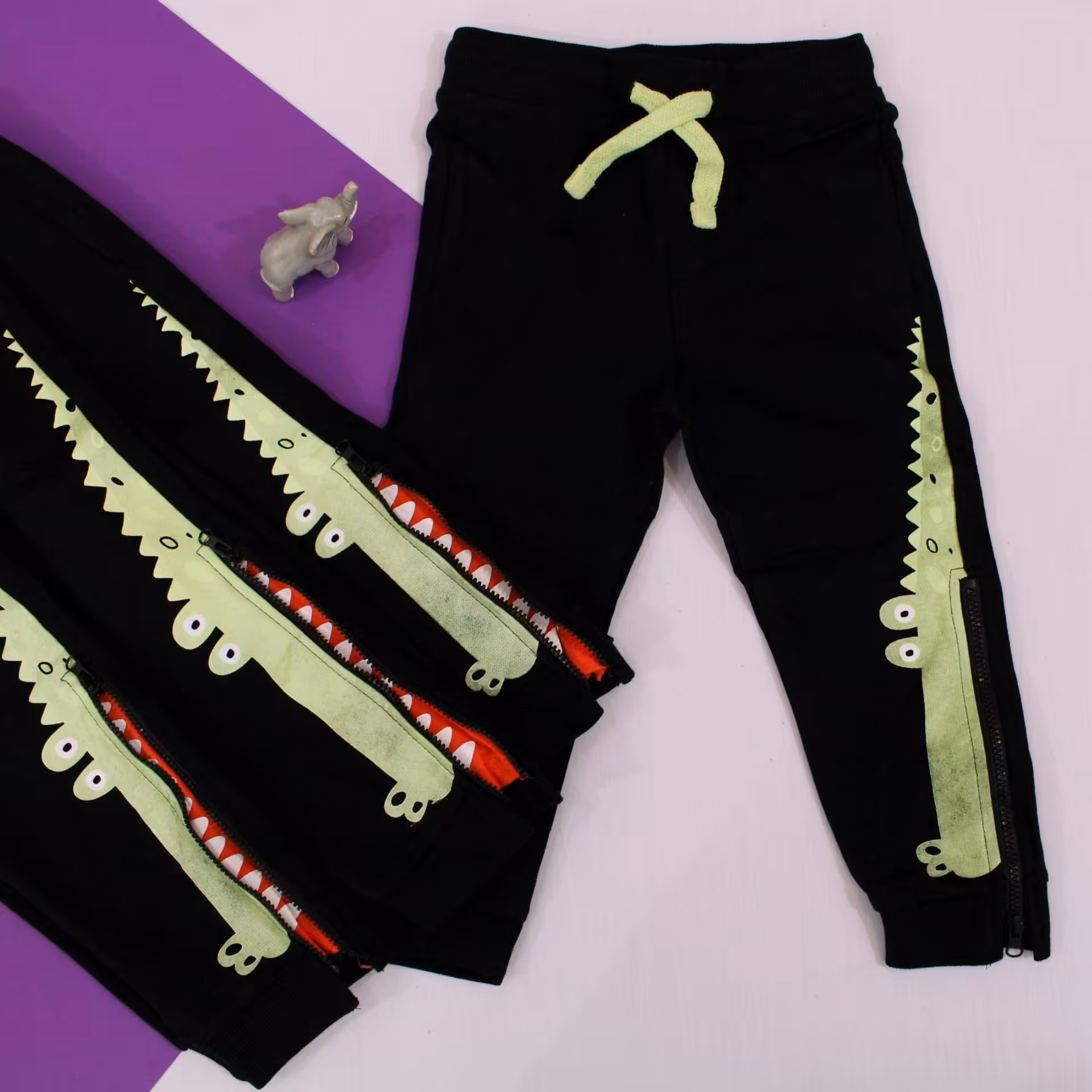 شلوار اسلش پسرونه وارداتی طرح تمساحی تکرنگ مشکی