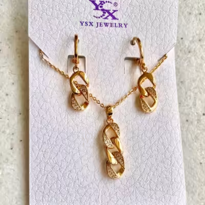 نیم ست زنانه طلایی مدل کارتیر