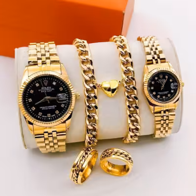 مجموعه ست ساعت رولکس بنداستیل طلایی صفحه مشکی  ست دستبند  ست حلقه