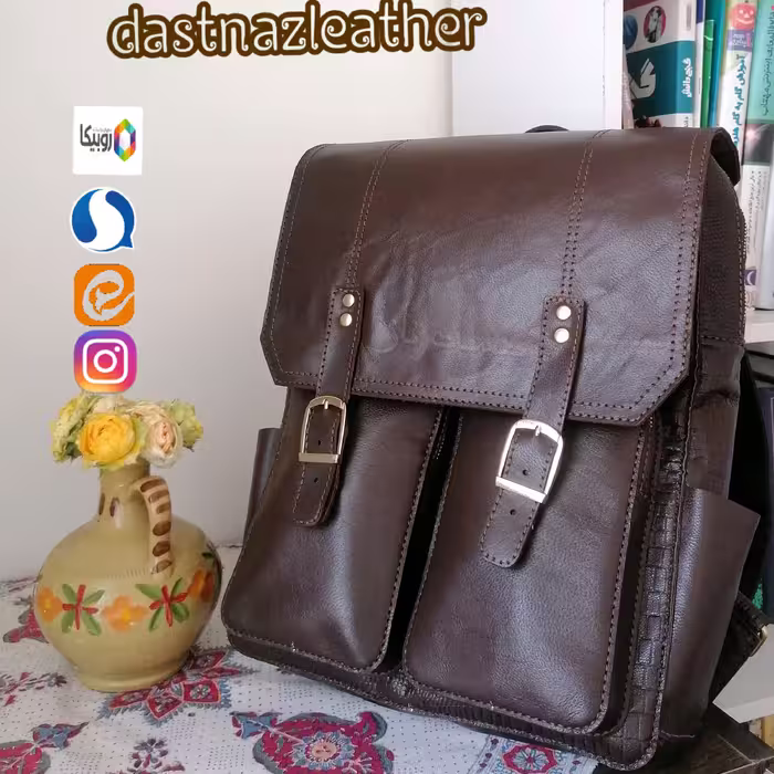 کوله لپ تاپ چرم                با دو جای مجزا  3 جیب جلو و زیپ پشت عمودی 