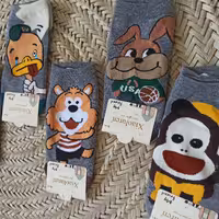 جوراب فانتزی مناسب دختر و پسر زمینه طوسی با طرح مختلف