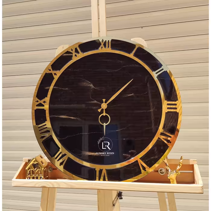 ساعت رزین رنگ ساعت  مشکی ساعت طرح مرمر  ساعت دور طلایی