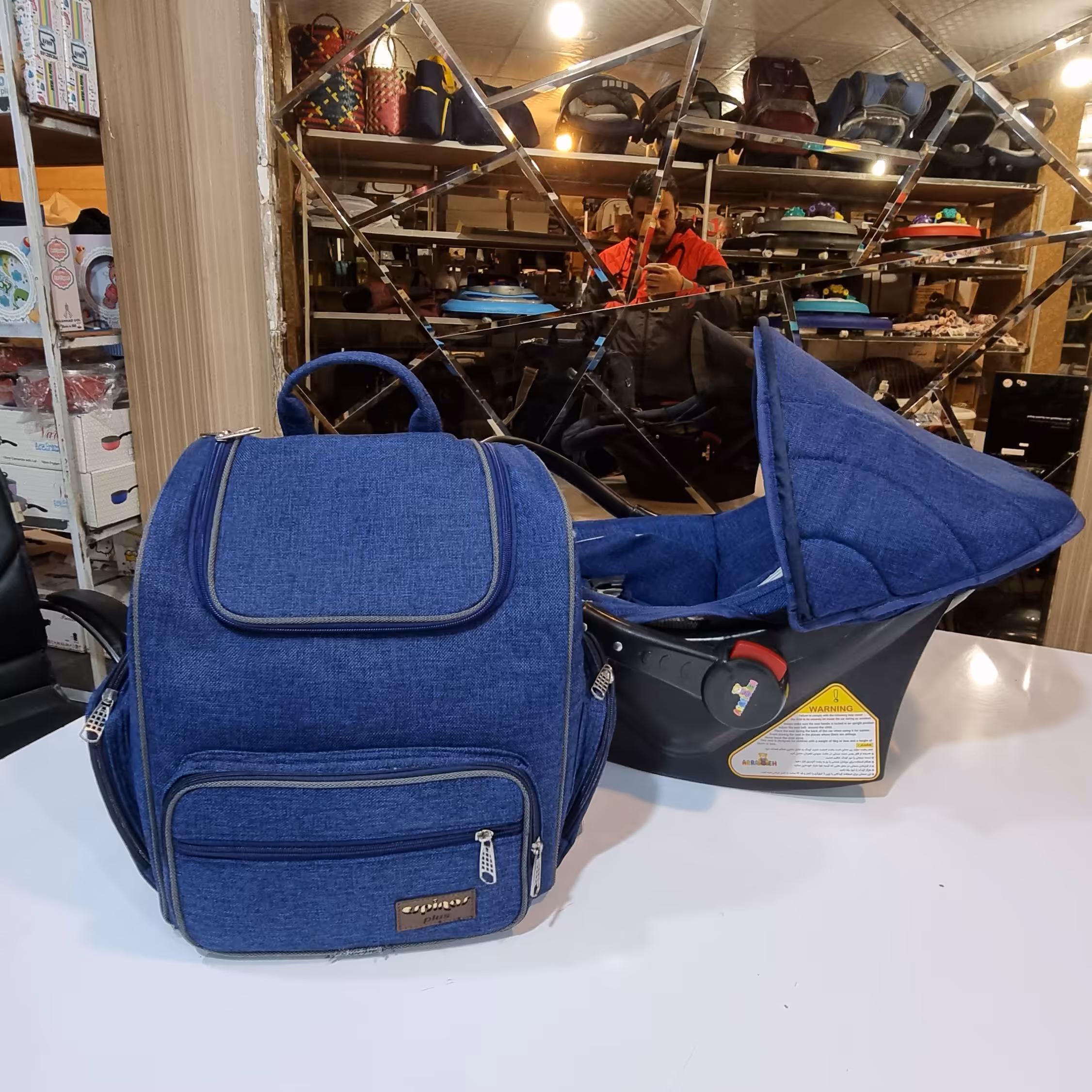 کریروساک لوازم نوزادی (سیسمونی نی نی دلی)