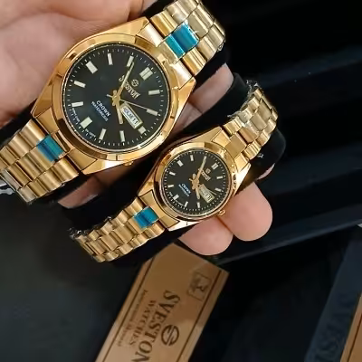 ساعت ست زنانه و مردانه Sveston طلایی اصل موتور ژاپن میوتا مدل SV 1002