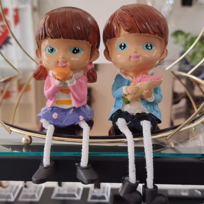 مجسمه پا آویز دختر پسر