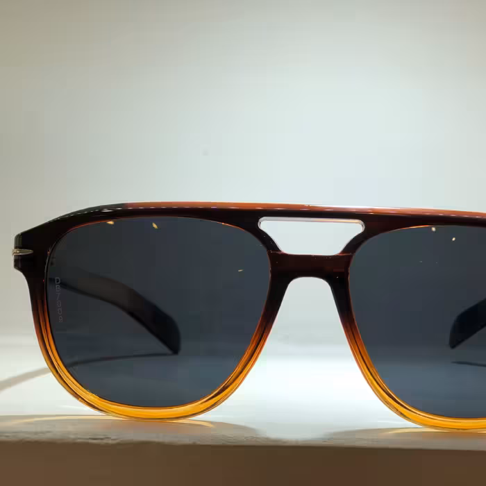 عینک آفتابی برند دیوید بکهام با عدسی پلی کربنات و فیلتر UV و شفافیت دید بالا