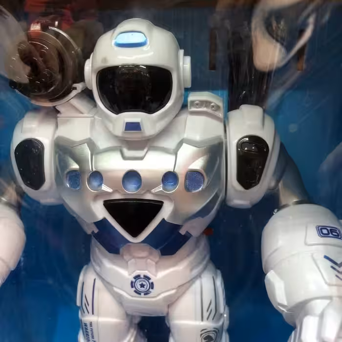 اسباب بازی ربات قهرمان موزیکال و چراغدار و تیر پرتابی مناسب برای بالای 6 سال