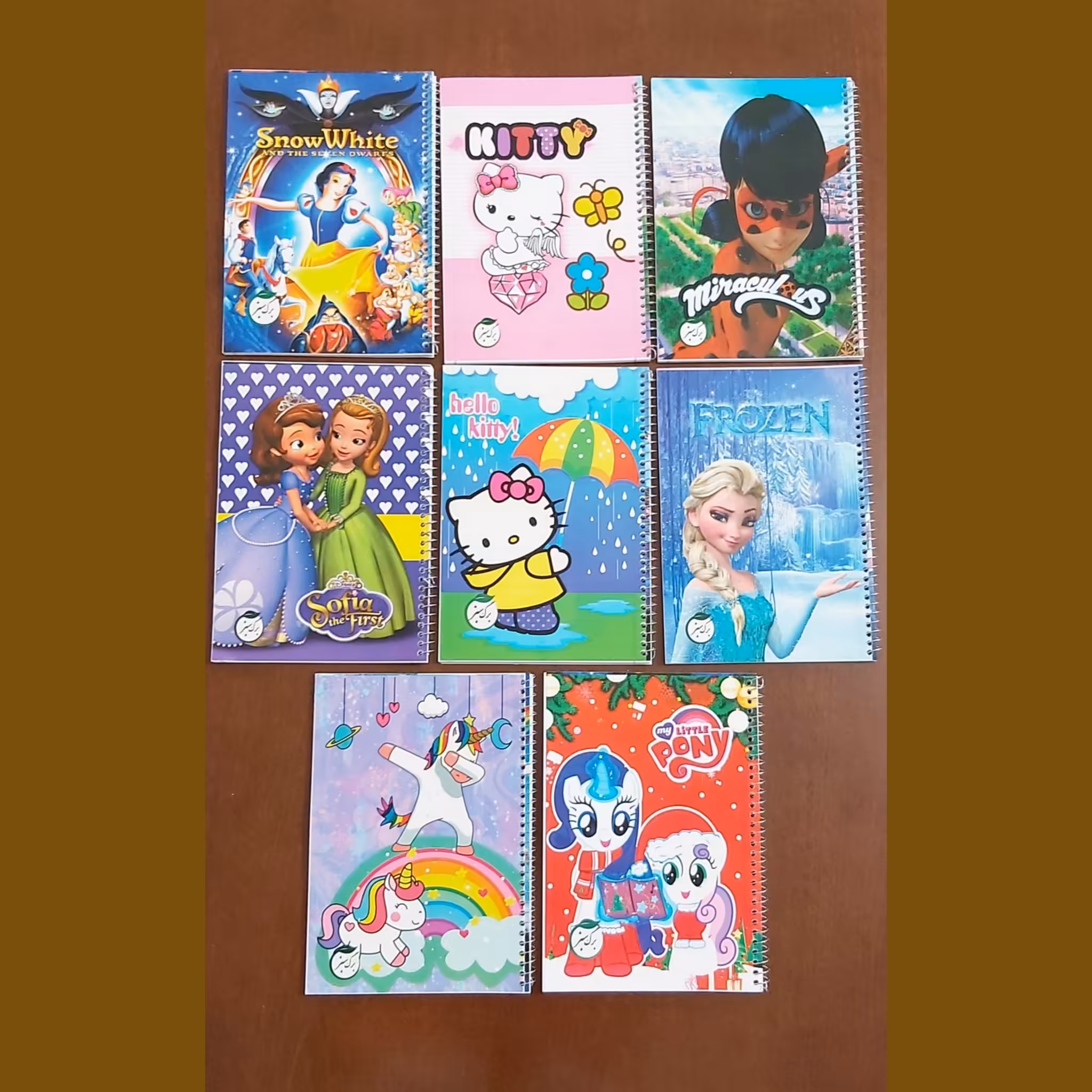 دفتر 50 برگ سیمی طلقی فانتزی خطی در طرح های متنوع دخترانه و پسرانه