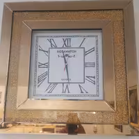 ساعت آیینه و اکلیلی