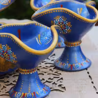 ست سفالی هفت سین نقطه کوب شده با 6عدد جام ویک عدد آینه و یک عدد جای سبزه