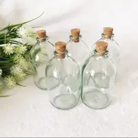بطری شیشه ای با درب چوب پنبه بسته 10 عدد ابعاد ارتفاع 10 و قطر کف شیشه 5 سانت