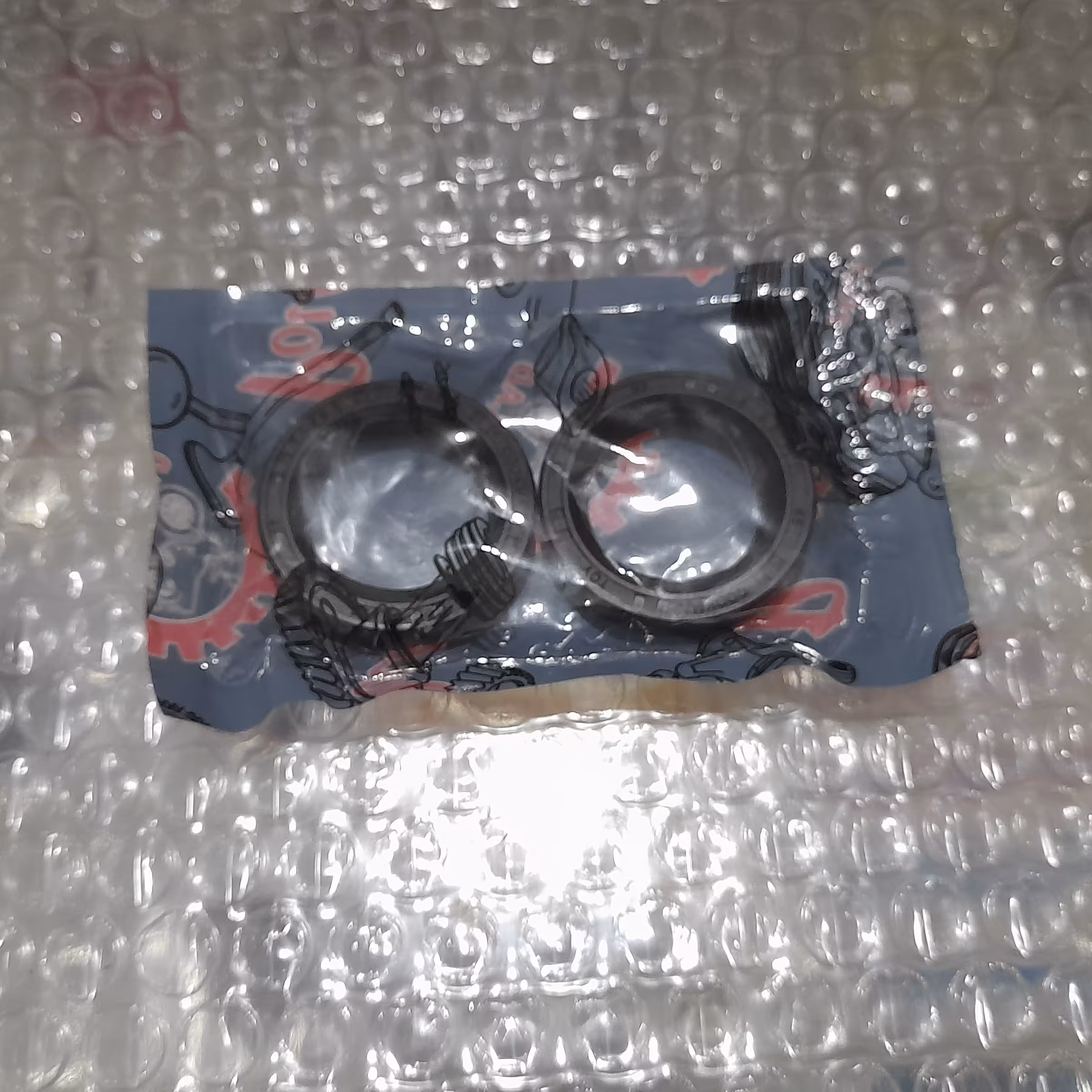 کاسه نمد کمک جلو موتور هندا جفت(بسته 2 عددی)لبه دار