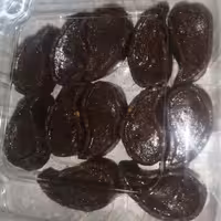 تقویتی خرما و کنجد  غنی شده با  آرد جوانه گندم