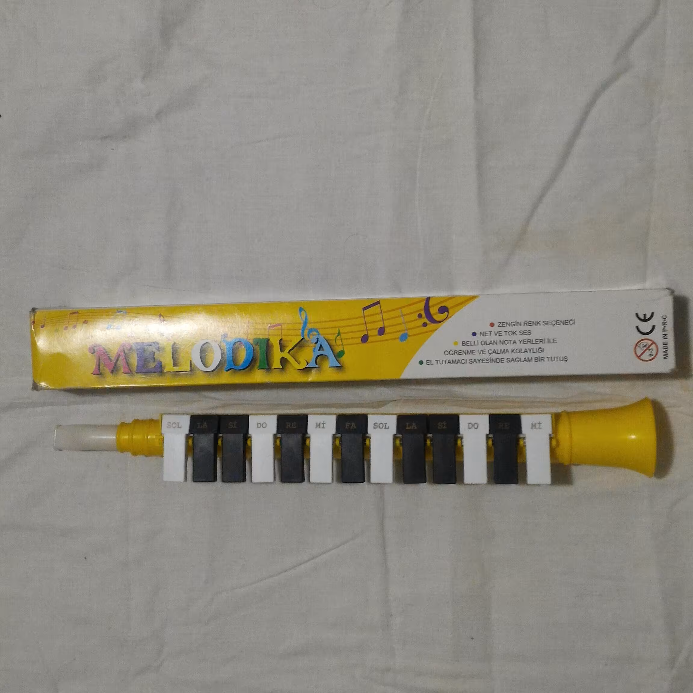 ملودیکا اسباب بازی با دکمه های متحرک دررنگ زرد