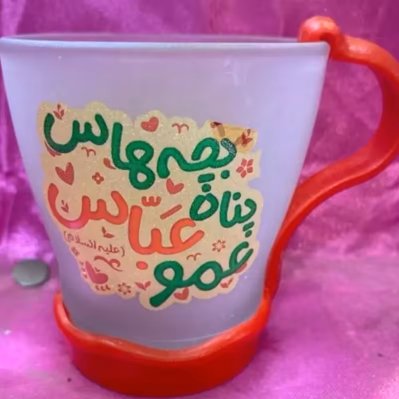102786-لیوان شیشه ای مات کودکانه عمو عباس قرمز و مشکی- ارتفاع 7.5-دسته پلاستیکی