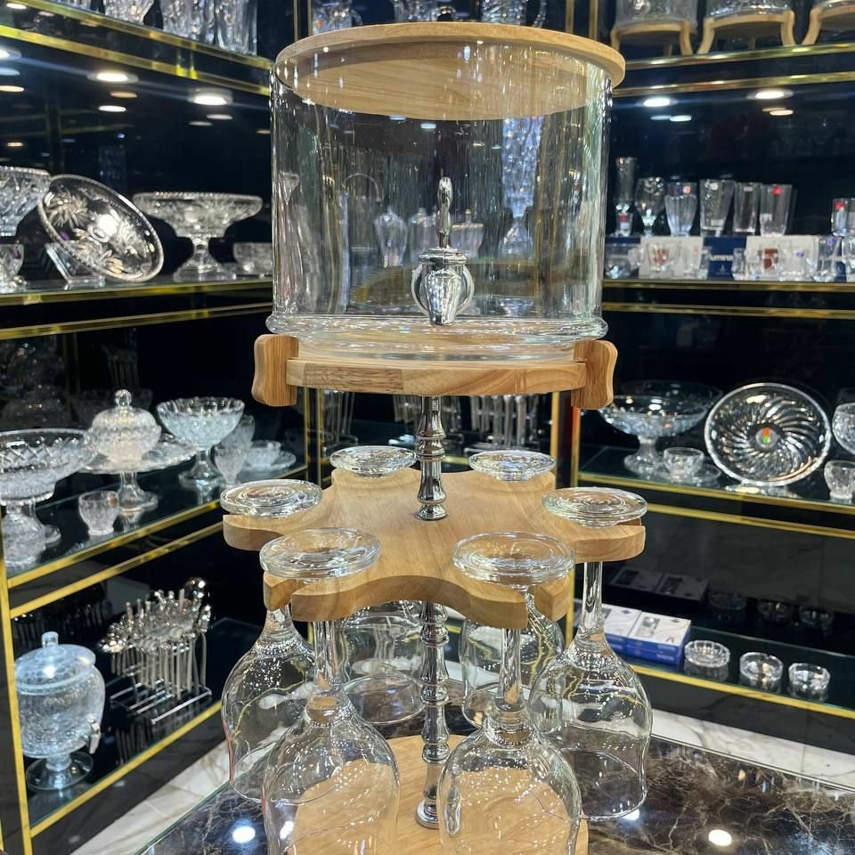 کلمن شیشه ای بار پایه دار چوبی به همراه گیلاس خوری چلیپا