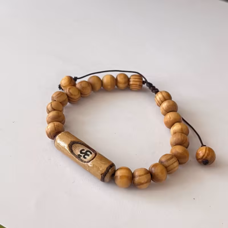 دستبند چوبی مهره دست ساز اُم
