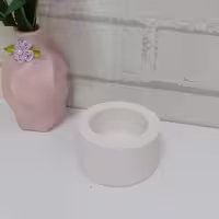 بیس خام  جا شمعی استوانه یا فانوسی برای استفاده در شمع سازی و جا شمعی کنار آینه هفت سین جنس پودر سنگ هنری 