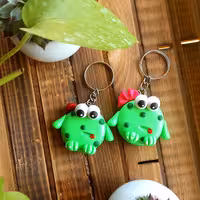 جا سوئیچی و مگنت مدل غورباقه دختر و پسر قابل استفاده به عنوان آویز ماشین و بند فلش