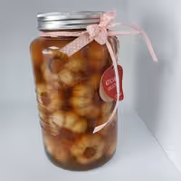 سیر ترشی شیشه ای  1ساله طبیعی.ترد