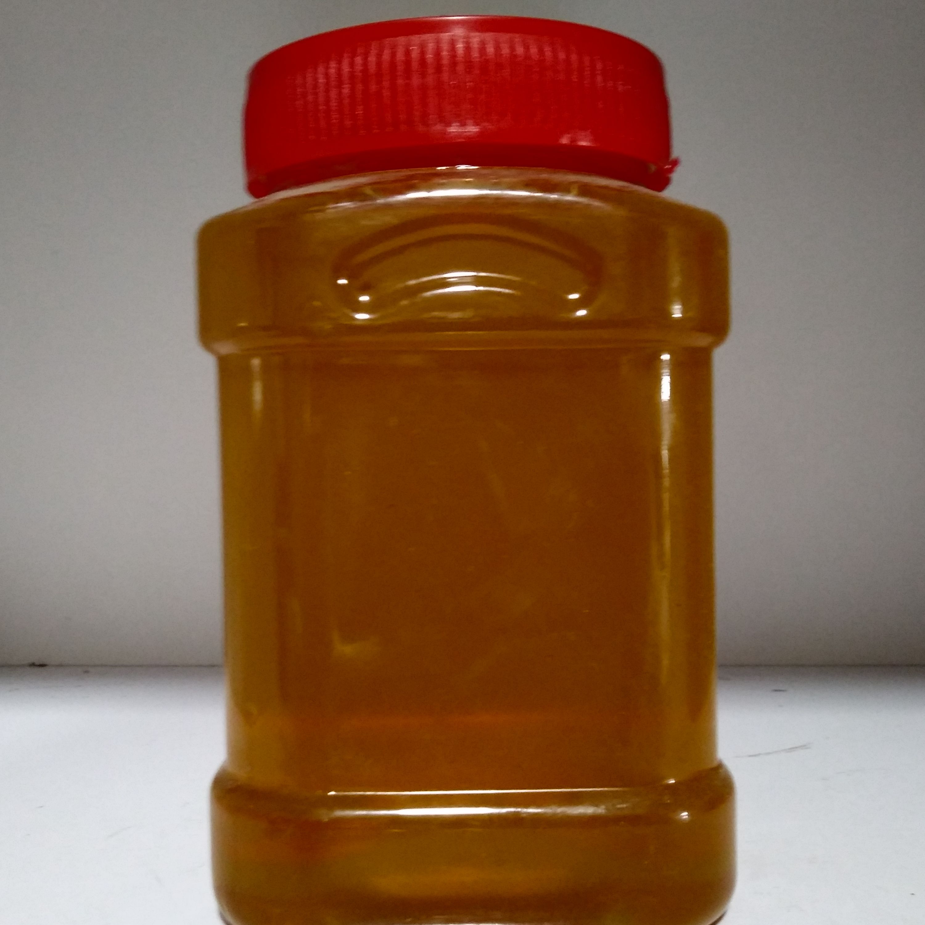 عسل چهل گیاه طبیعی(نیم کیلوئی)