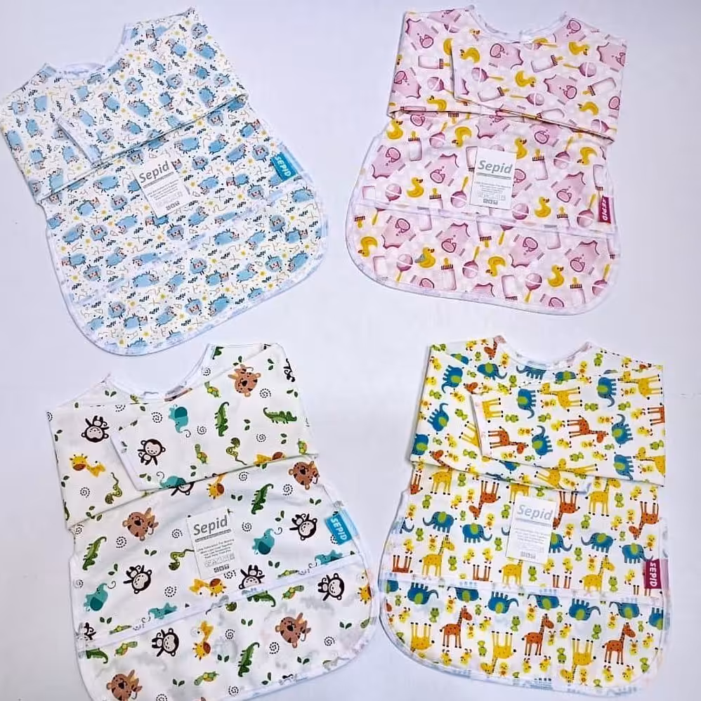 پیش بند پلاستیکی آستین دار نوزادی سپید 