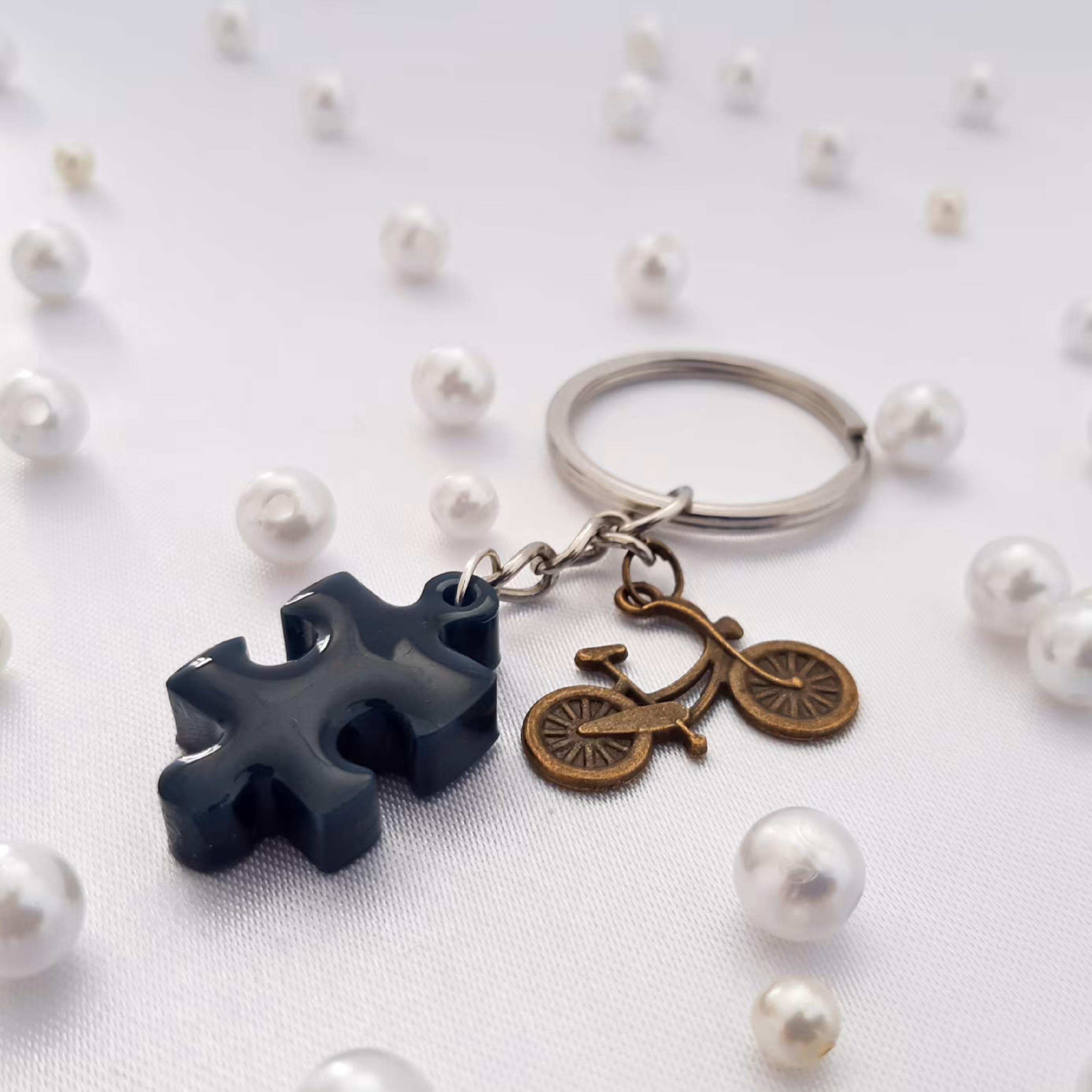 سرکلیدی وجاسوییچی رزینی طرح پازل با آویز دوچرخه