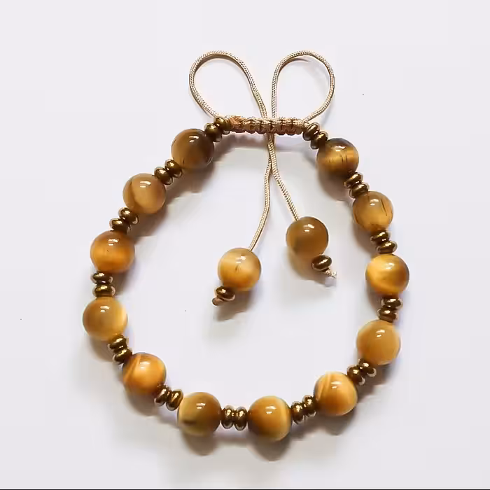 دستبند مدل ماهورا با سنگ چشم گربه اصل و هماتیت طلایی مناسب خانم ها و آقایان 